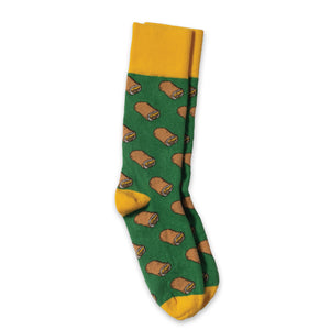 Kelly green socks with a yellow top band, heel and toes. There is a repeating pattern of cartoon Cheese Runza® Sandwiches throughout the sock. 